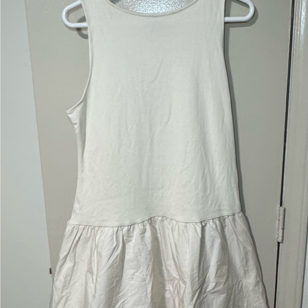 Ivory Sleeveless Ruffle-Hem Dress